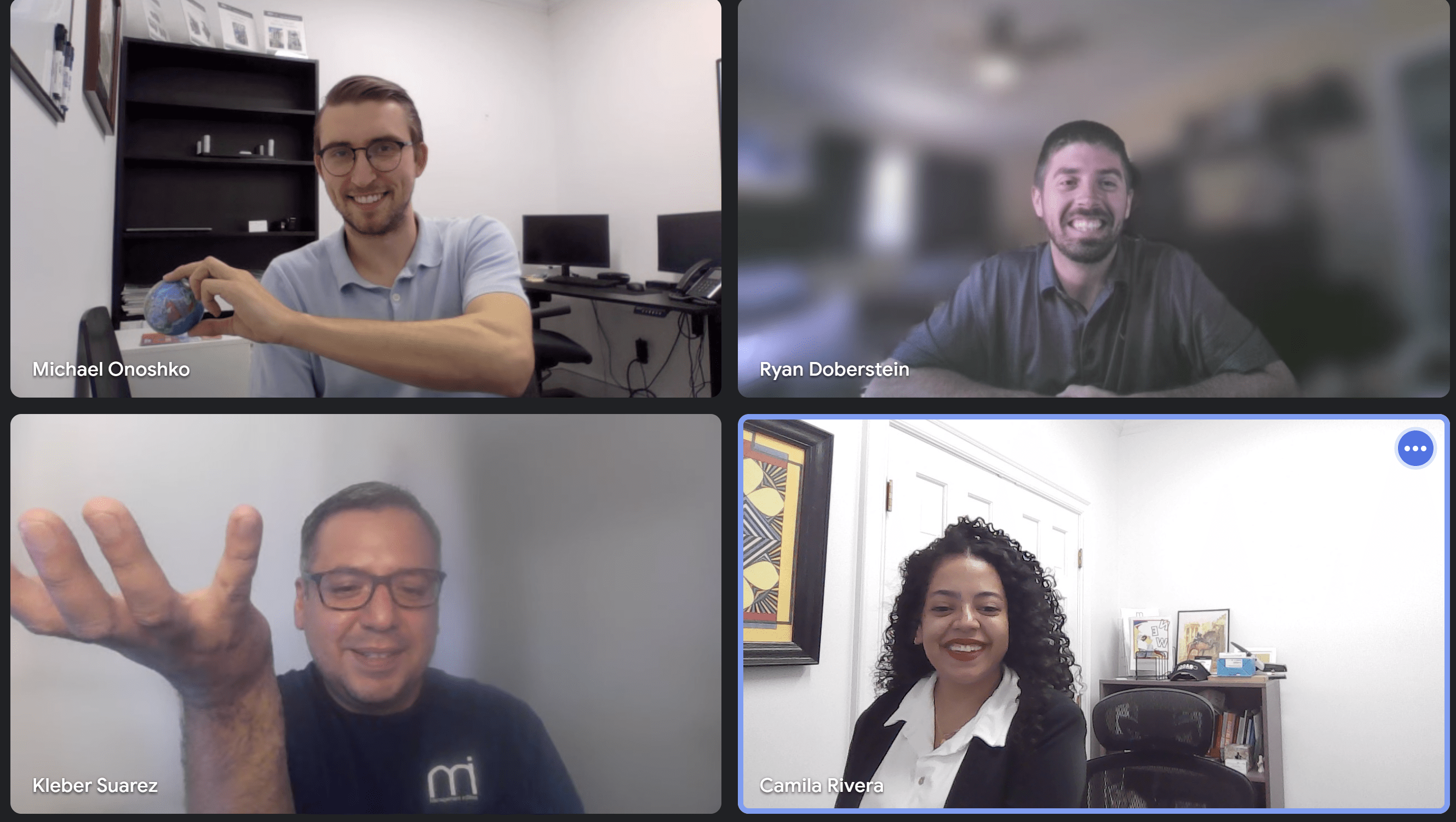 At MI, We Give Our Employees the World 8 MI employees recognizing a team member's outstanding contribution to the work meeting by "passing the globe"